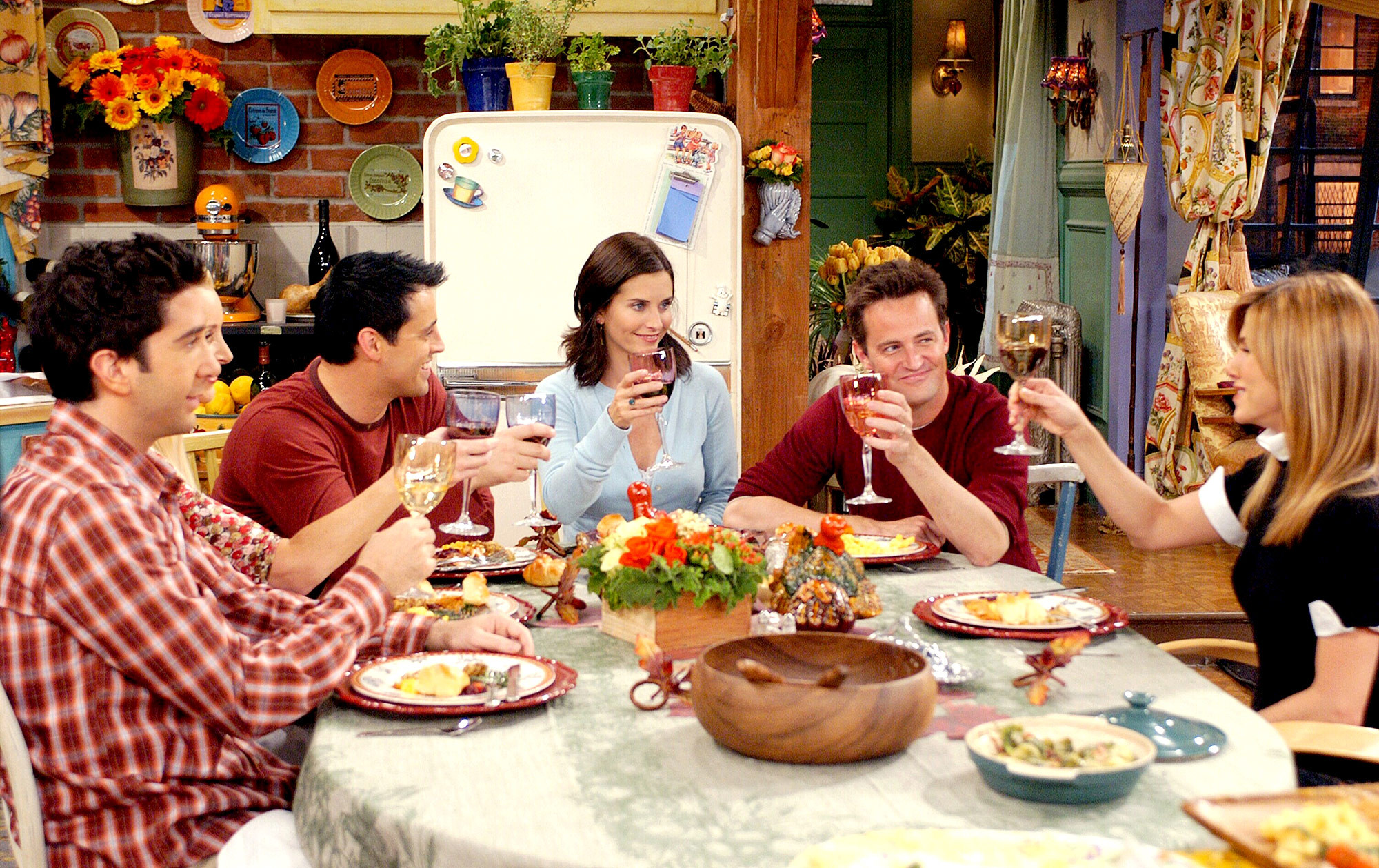 cast of Friends eating holiday meal together