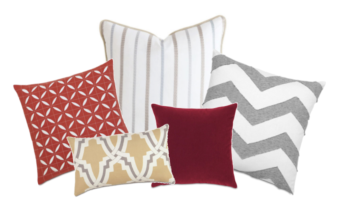 assortment of holiday colored Eastern Accents decorative pillows