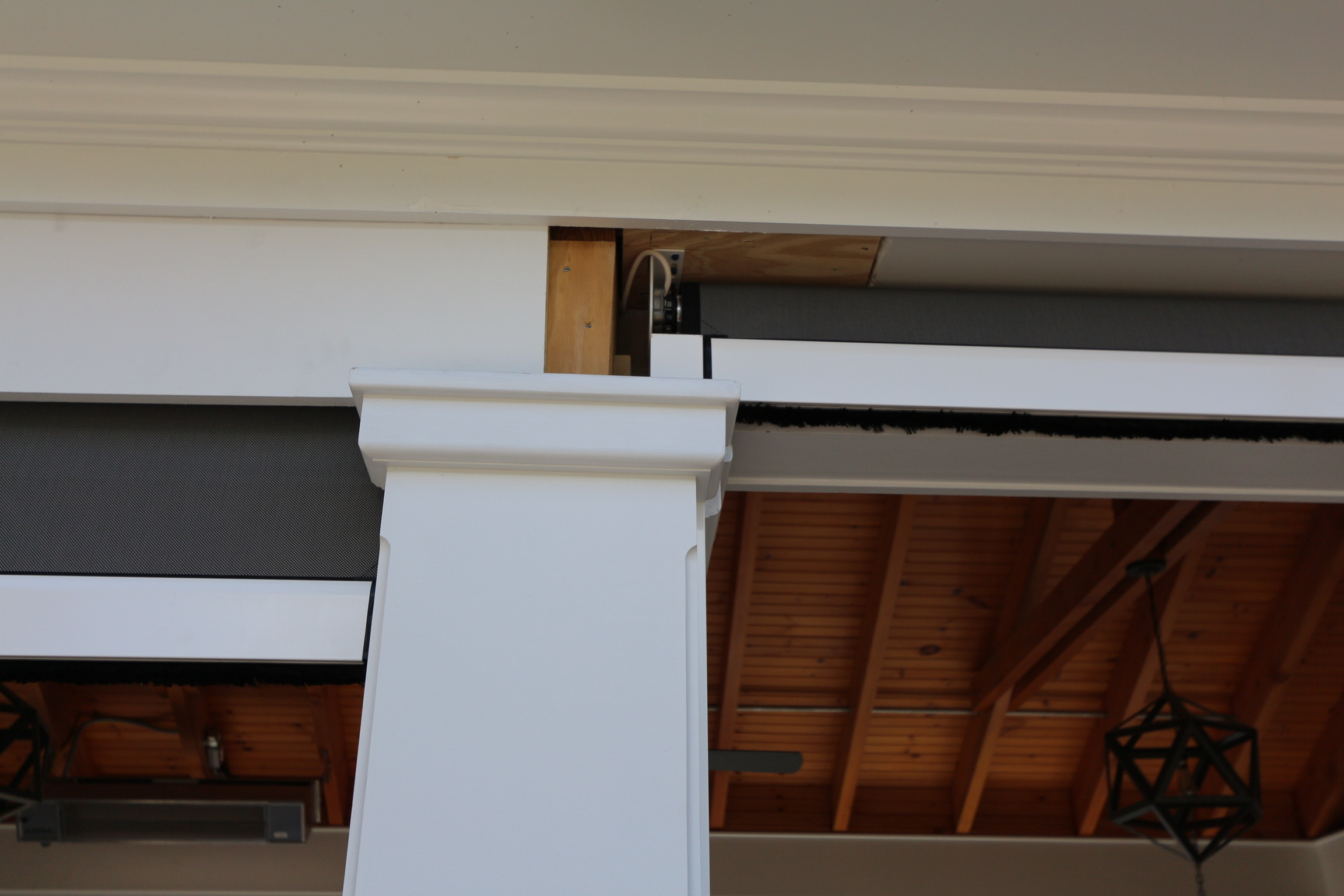 Rainier outdoor shades headrail installed in the cavity of pavilion