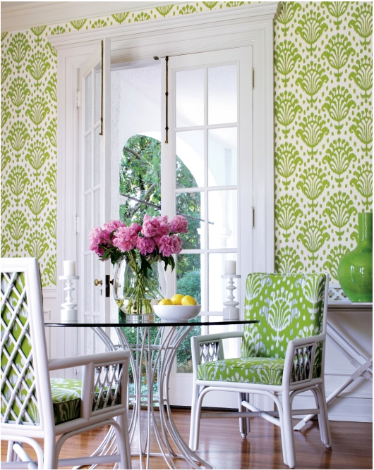 Large scale green print Thibaut wallpaper with matching dining room chair cushions