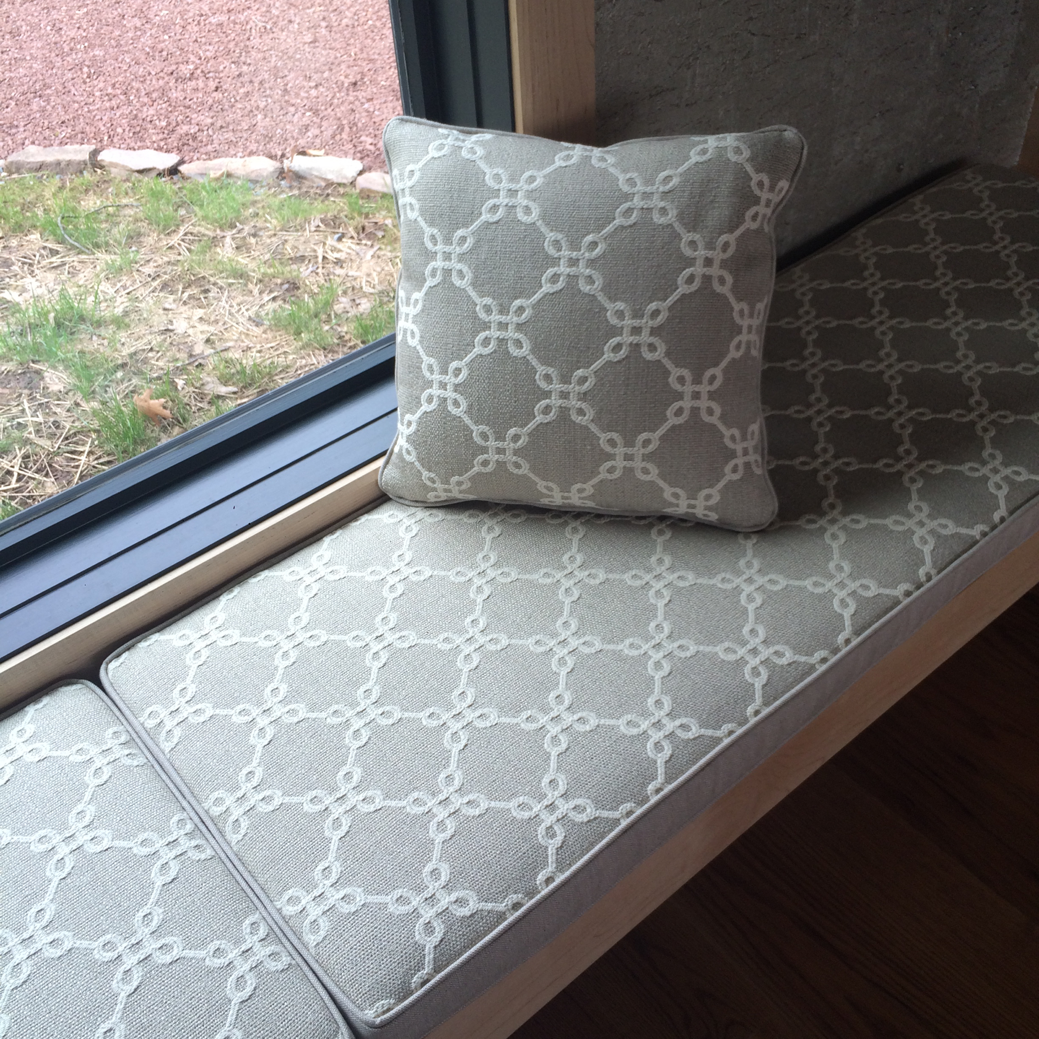 Gray upholstered window bench seat